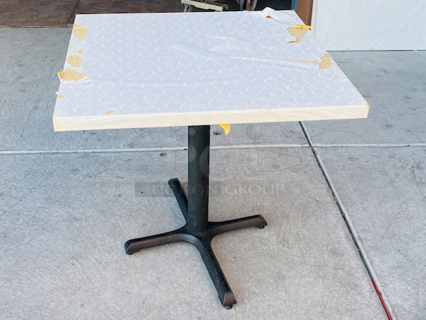 AWESOME!!! Wood Tables, 31-3/4x29-3/4.

The table and base are in perfect condition. The stapled-on vinyl cover is slightly damaged and can easily be replaced or covered with a table cloth.

23-3/4x29-3/4x30  - Image 2 of 4