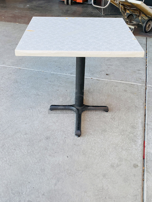 AWESOME!!! Wood Tables, 31-3/4x29-3/4.

The table and base are in perfect condition. The stapled-on vinyl cover is slightly damaged and can easily be replaced or covered with a table cloth.

23-3/4x29-3/4x30  - Image 2 of 4