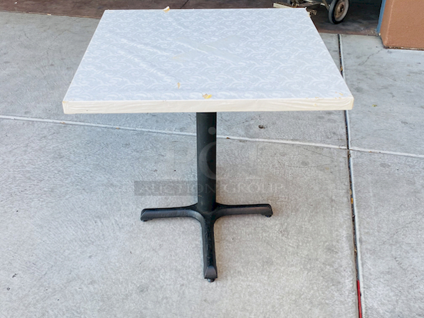 AWESOME!!! Wood Tables, 31-3/4x29-3/4.

The table and base are in perfect condition. The stapled-on vinyl cover is slightly damaged and can easily be replaced or covered with a table cloth.

23-3/4x29-3/4x30  - Image 2 of 5