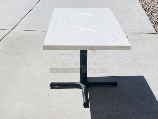 AWESOME!!! Wood Tables, 48x31.

The table and base are in perfect condition. The stapled-on vinyl cover is slightly damaged and can easily be replaced or covered with a table cloth.

23-3/4x29-3/4x30  - Image 4 of 5