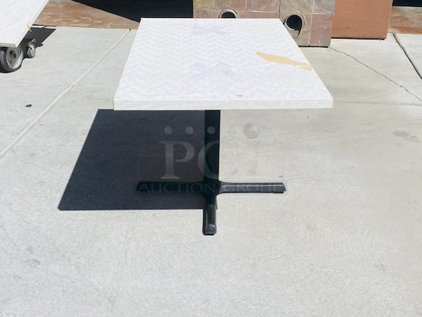 AWESOME!!! Wood Tables, 48x31.

The table and base are in perfect condition. The stapled-on vinyl cover is slightly damaged and can easily be replaced or covered with a table cloth.

23-3/4x29-3/4x30  - Image 2 of 5