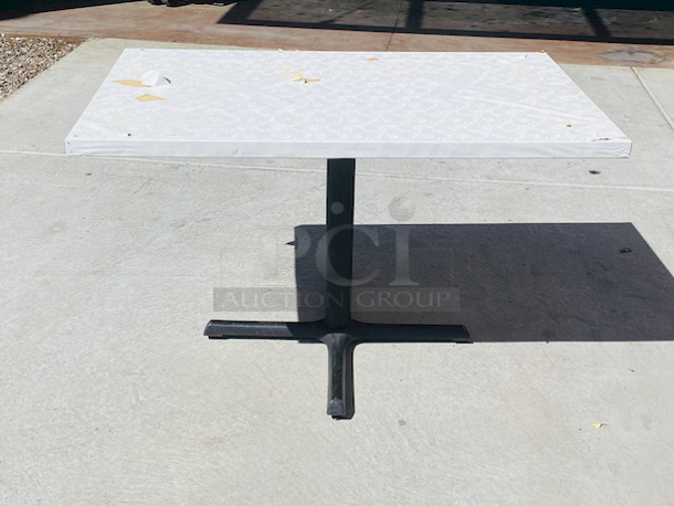 AWESOME!!! Wood Tables, 31x48.

The table and base are in perfect condition. The stapled-on vinyl cover is slightly damaged and can easily be replaced or covered with a table cloth.

23-3/4x29-3/4x30  - Image 3 of 5