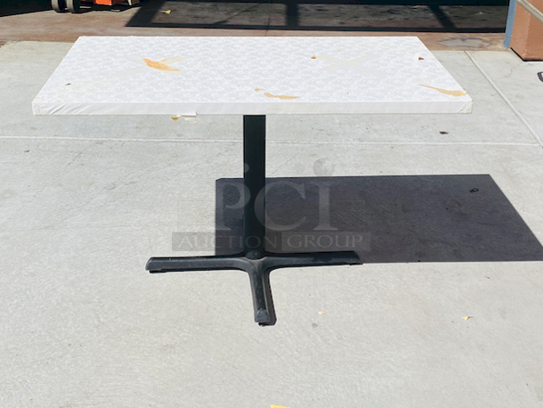 AWESOME!!! Wood Tables, 31x48.

The table and base are in perfect condition. The stapled-on vinyl cover is slightly damaged and can easily be replaced or covered with a table cloth.

23-3/4x29-3/4x30  - Image 3 of 5