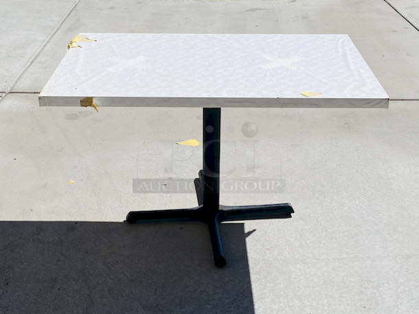 AWESOME!!! Wood Tables, 31x48.

The table and base are in perfect condition. The stapled-on vinyl cover is slightly damaged and can easily be replaced or covered with a table cloth.

23-3/4x29-3/4x30 