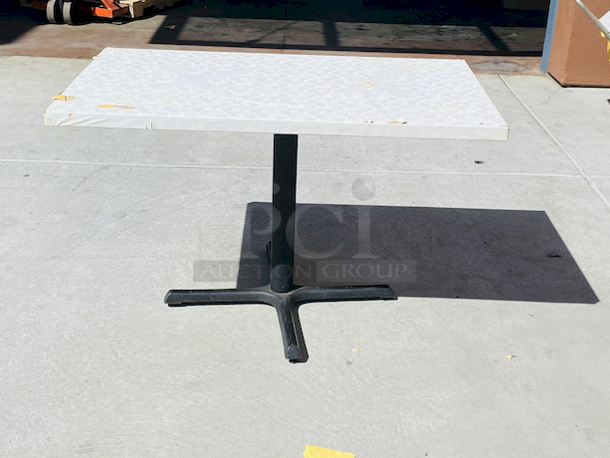 AWESOME!!! Wood Tables, 31x48.

The table and base are in perfect condition. The stapled-on vinyl cover is slightly damaged and can easily be replaced or covered with a table cloth.

31x48x30 - Image 3 of 7