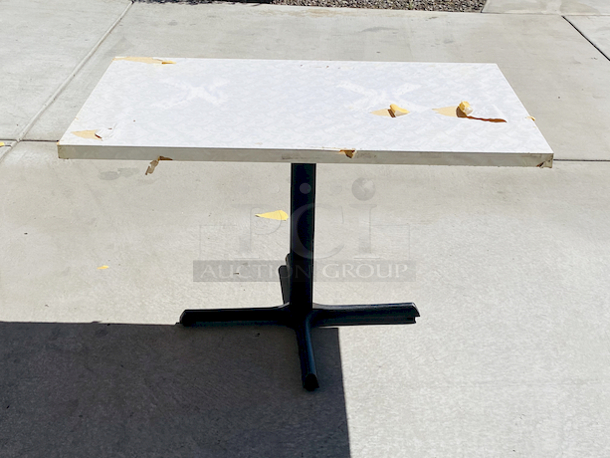 AWESOME!!! Wood Tables, 31x48.

The table and base are in perfect condition. The stapled-on vinyl cover is slightly damaged and can easily be replaced or covered with a table cloth.

31x48x30