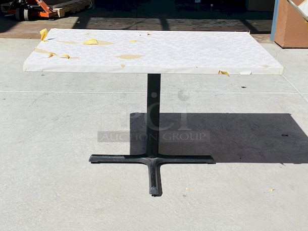 AWESOME!!! Wood Tables, 31x48.

The table and base are in perfect condition. The stapled-on vinyl cover is slightly damaged and can easily be replaced or covered with a table cloth.

31x48x30 - Image 3 of 5