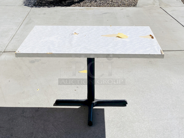 AWESOME!!! Wood Tables, 31x48.

The table and base are in perfect condition. The stapled-on vinyl cover is slightly damaged and can easily be replaced or covered with a table cloth.

31x48x30