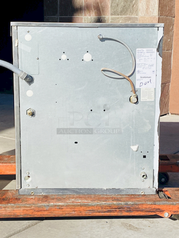 NUGGETS STYLE ICE! Scotsman N0922W-32A 1094 Lb Nugget Ice Machine - Water Cooled, Prodigy Series Ice Maker. removed From Raising Cane's Nugget style ice Water-cooled, self-contained condenser Up to 1094 lb production/24 hours Stainless steel finish 208-230 volts, 60 Hz, 1-phase, 17.9 amps UL, NSF, CE 22.9” x 24” x 27”

Missing Face cover.	 - Image 4 of 11