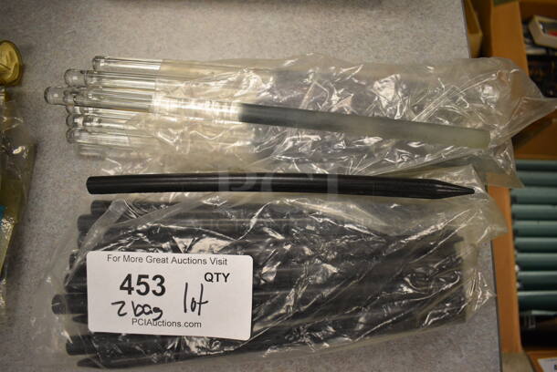 ALL ONE MONEY! Lot of 2 Bags of Clear and Black Rods! (Midtown 2: Room 105)