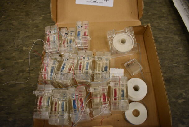 ALL ONE MONEY! Lot of 12 Cord Dispensers. 2.25x2.25x1. (Midtown 2: Room 105) - Image 2 of 4