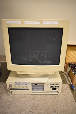 Dell Trinitron 16" Computer Monitor on Hewlett Packard Vectra Computer Tower. 17x17x21.5. (Midtown 2: Room 105)