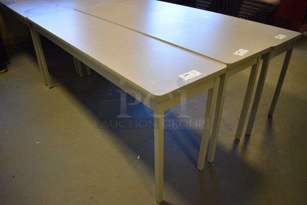 2 Gray Table on Metal Legs. 72x18x29. 2 Times Your Bid! (Midtown 2: Room 130)