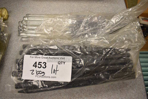 ALL ONE MONEY! Lot of 2 Bags of Clear and Black Rods! (Midtown 2: Room 105) - Image 2 of 4