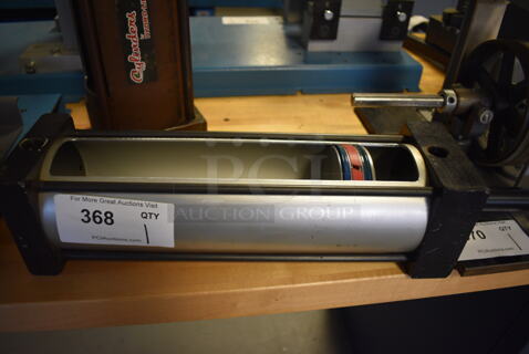 Starcy Model ST3P2-4x12-#S Metal Air Cylinder. 18.5x4.5x4.5. (Midtown 2: Room 130)