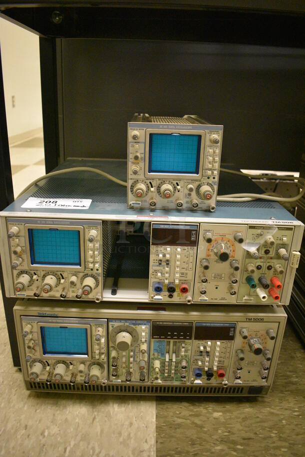 2 Tektronix Model TM5006 Unit w/ SC502 15MHz Oscilloscope, Function Generator, Universal Counter Timer, DM 502A Autoranging DMM. Comes w/ Extra SC502 15MHz Oscilloscope. 17x19x6. 2 Times Your Bid! (Midtown 2: Room 105)