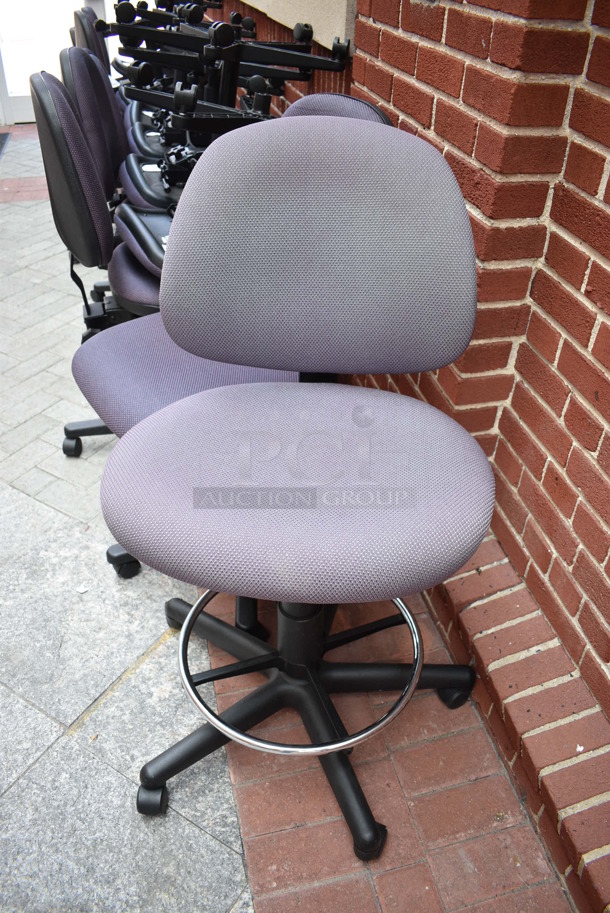8 Various Purple Office Chairs on Casters; 1 Has Foot Bar. 19x24x40, 21x22x40. 8 Times Your Bid! (Midtown 2: Atrium)