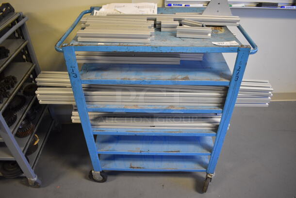 Metal Cart w/ Contents on Commercial Casters. 34x22x40. (Midtown 2: Room 130) - Image 1 of 5