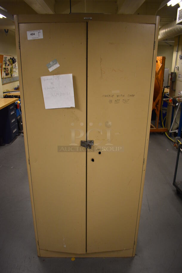 Lyon Tan Metal 2 Door Filing Cabinet. Does Not Include Contents. 36x21x78. (Midtown 2: Room 130)