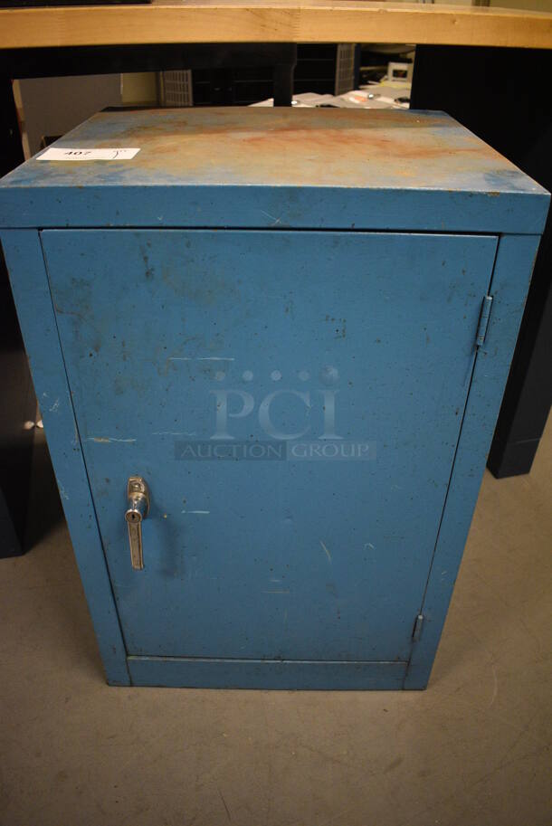Blue Metal Single Door Cabinet. 20x18x31. (Midtown 2: Room 130)