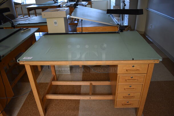 Wooden Drafting Table w/ 5 Drawers and Attached Metal Light. 60x40x68. Table: 60x39x37.5. (Midtown 2: Second Floor: Room 216)