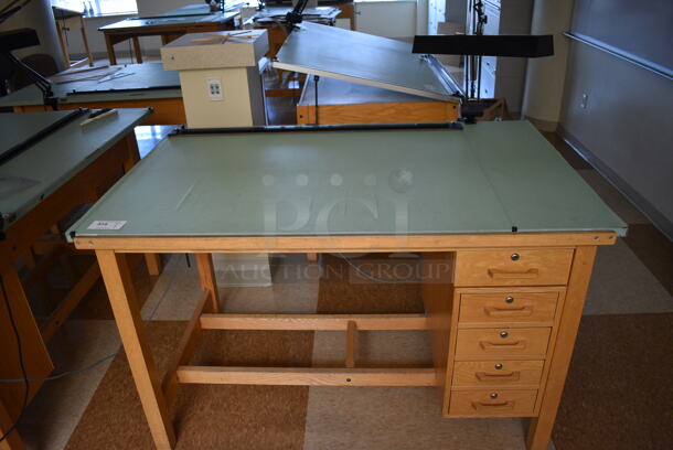 Wooden Drafting Table w/ 5 Drawers and Attached Metal Light. 60x40x68. Table: 60x39x37.5. (Midtown 2: Second Floor: Room 216) - Image 1 of 6