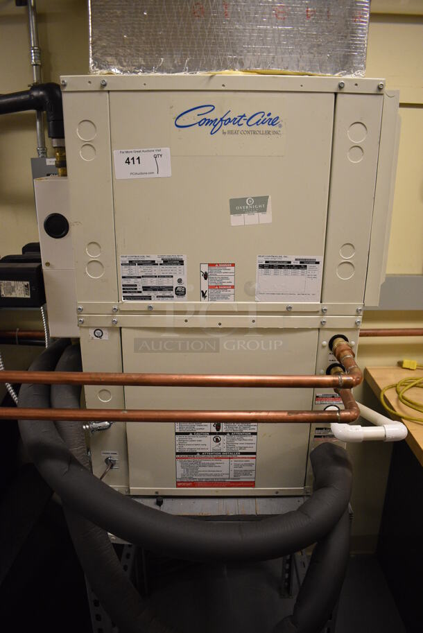 Comfort-Cure Model HRV024B1C01ART Metal Water Furnace. 208/230 Volts, 1 Phase. 32x24x51. Unit Will Be Unhooked and Removed Before Pick Up Day. (Midtown 2: Room 130)
