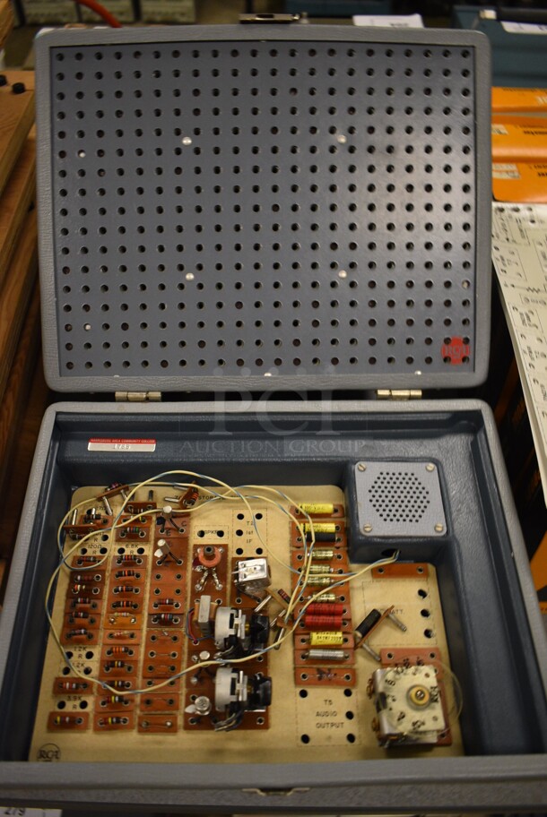 2 Superheterodyne Receivers in Hard Case. 12.5x9x5. 2 Times Your Bid! (Midtown 2: Room 105)