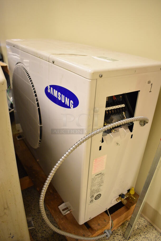 Samsung Model US18A6RC Metal Commercial Split Type Air Conditioner. Cooling Unit Only - Does Not Come w/ Fan Coil. 208/230 Volts, 1 Phase. 35x13x25. (Midtown 2: Hallway)