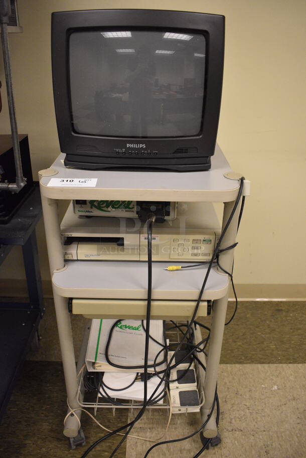 Philips Television w/ Reveal Unit, Sony Color Video Printer and Cart. Cart 18x22x35. TV 14x13x13. (Midtown 2: Room 105)