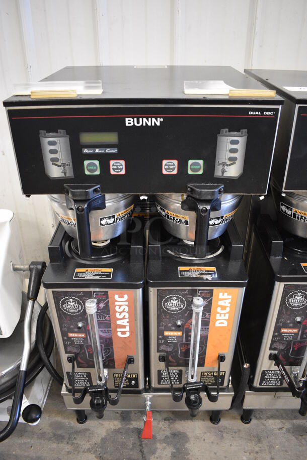 NICE! 2012 Bunn Model DUAL SH DBC Stainless Steel Commercial Countertop Dual Coffee Machine w/ Hot Water Dispenser, 2 Bunn Model SH SERVER Satellite Servers and 2 Metal Brew Baskets. 120/208-240 Volts, 1 Phase. 18x24x37. Tested and Working!
