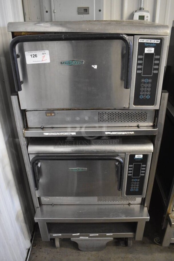2 FANTASTIC! Turbochef Model NGCD6 Tornado Stainless Steel Commercial Countertop Electric Powered Rapid Cook Ovens on Stainless Steel Commercial 2 Tier Equipment Stand w/ Commercial Casters. Top Is 2013, Bottom Is 2012. 208/240 Volts, 1 Phase. 30x30x60. 2 Times Your Bid! Tested and Working!