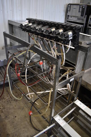 8 Flojet Soda Pumps on Chrome Finish Soda Rack. 41x16x47. 8 Times Your Bid!