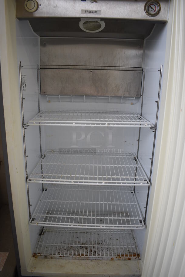 NICE! 2013 Kelvinator Model KFS220RHY2 Stainless Commercial Single Door Reach In Freezer w/ Poly Coated Racks on Commercial Casters. 115 Volts, 1 Phase. 32x28x75. Tested and Working! - Image 4 of 7