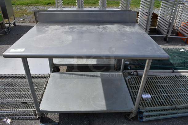 Stainless Steel Commercial Table w/ Backsplash and Undershelf on Commercial Casters. 48x30x42