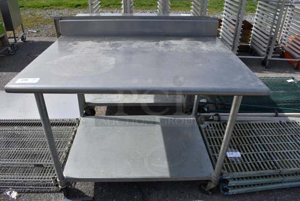 Stainless Steel Commercial Table w/ Backsplash and Undershelf on Commercial Casters. 48x30x42 - Image 1 of 5