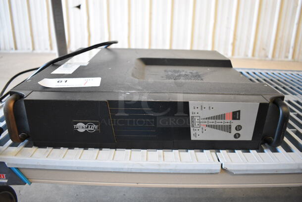 Tripp Lite Model SU 1000RT Rack Unit. 17x19x4