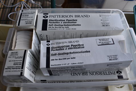 6 Boxes of Various Size Sterilization Pouches in Clear Poly Bin w/ Lid. 17x11x7. 6 Times Your Bid!