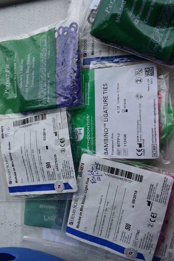 ALL ONE MONEY!  Lot of Various Items Including Ploy Tubes, Molder Bracket Ties and Extraoral Cheek Retractors in Blue Poly Bin. 11x12x9 - Image 4 of 7