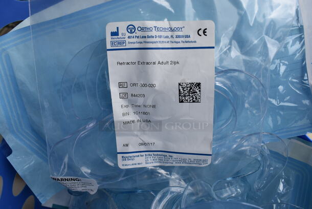 ALL ONE MONEY!  Lot of Various Items Including Ploy Tubes, Molder Bracket Ties and Extraoral Cheek Retractors in Blue Poly Bin. 11x12x9 - Image 6 of 7