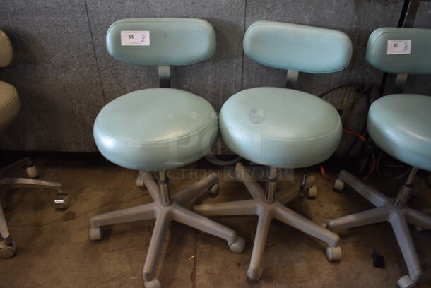 2 Green Office Chairs on Casters. 17x18x31. 2 Times Your Bid!