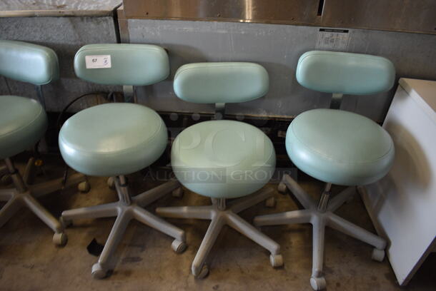 3 Green Office Chairs on Casters. 17x18x31. 3 Times Your Bid!