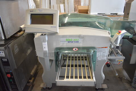 WOW! Mettler Toledo Model 0647 Solo Max Commercial Floor Style Scale Machine w/ Monitor. Goes GREAT w/ Items 77 and 78! 208 Volts, 1 Phase. 66x48x64