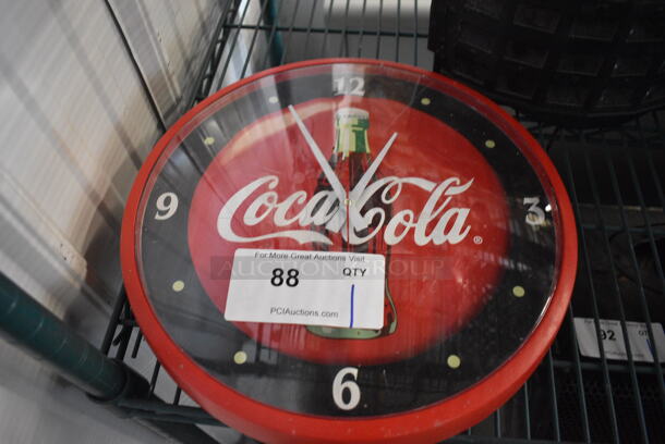 CocaCola Wall Mount Battery Powered Clock. 14x1.5x14