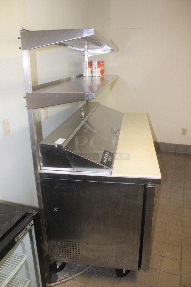 AMAZING! True Model TSSU-72-18 Commercial Stainless Steel 3 Door Sandwich/Salad Refrigerated Prep Table On Commercial Casters With Two Stainless Steel Shelves. 72x31x70. 115V/60Hz. Working When Closed! Buyer Must Remove! - Image 7 of 7