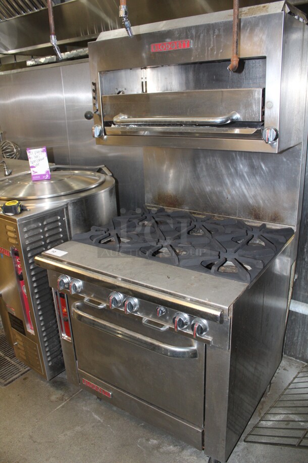 AMAZING! Blodgett Commercial Stainless Steel 6 Burner Natural Gas Range With Oven and Salamander/Broiler On Commercial Casters. 36x38x74. Working When Closed! Buyer Must Remove. 