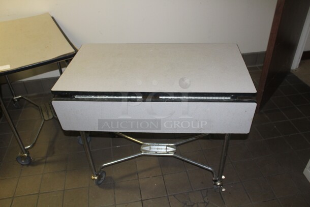 2 Drop Side Tables On Casters. 2X Your Bid. 36x36x30 - Image 1 of 3