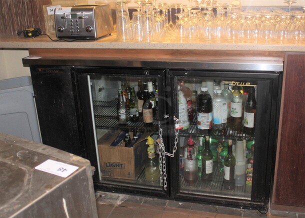 FANTASTIC! True Model TBB-2G Commercial 2 Glass Door Bar Back Refrigerator/Cooler. 59x28x37. 115V/60Hz. Working When Closed! Buyer Must Remove. Does Not Include Contents. 