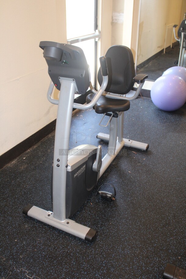SUPER FIND! Horizon Fitness Stationary Bike. 26x56x52. Buyer Must Remove.  - Image 1 of 3