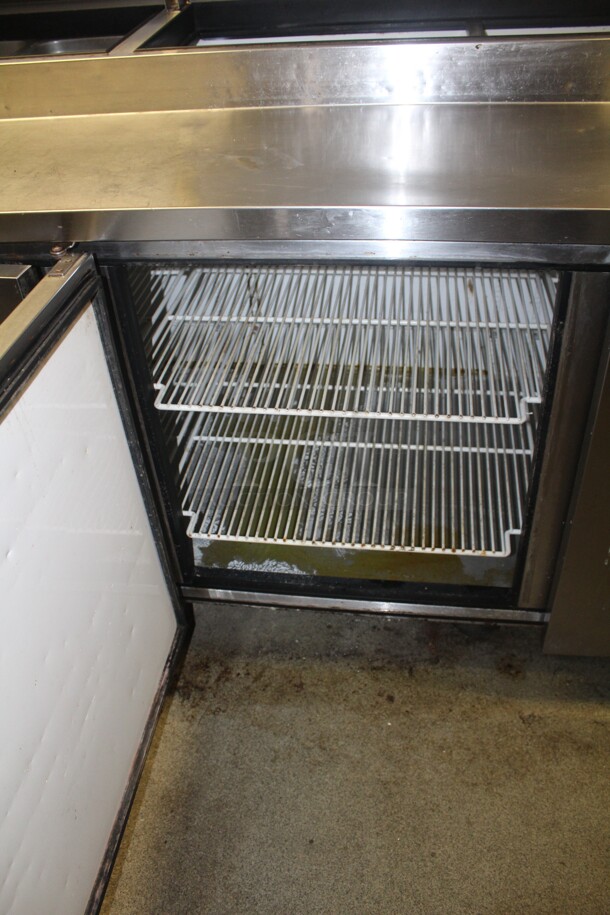 AWESOME! True Model TPP-93 Commercial Stainless Steel 3 Door Pizza Prep Table On Commercial Casters With Shelf.  - Image 7 of 9